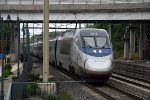 "Acela Express" races west as it approaches the station